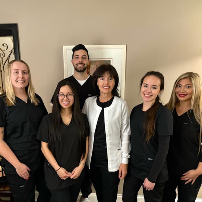 The Bright Smiles Dental team standing together, smiling