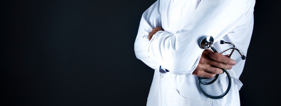 Doctor in a white coat holding a stethoscope
